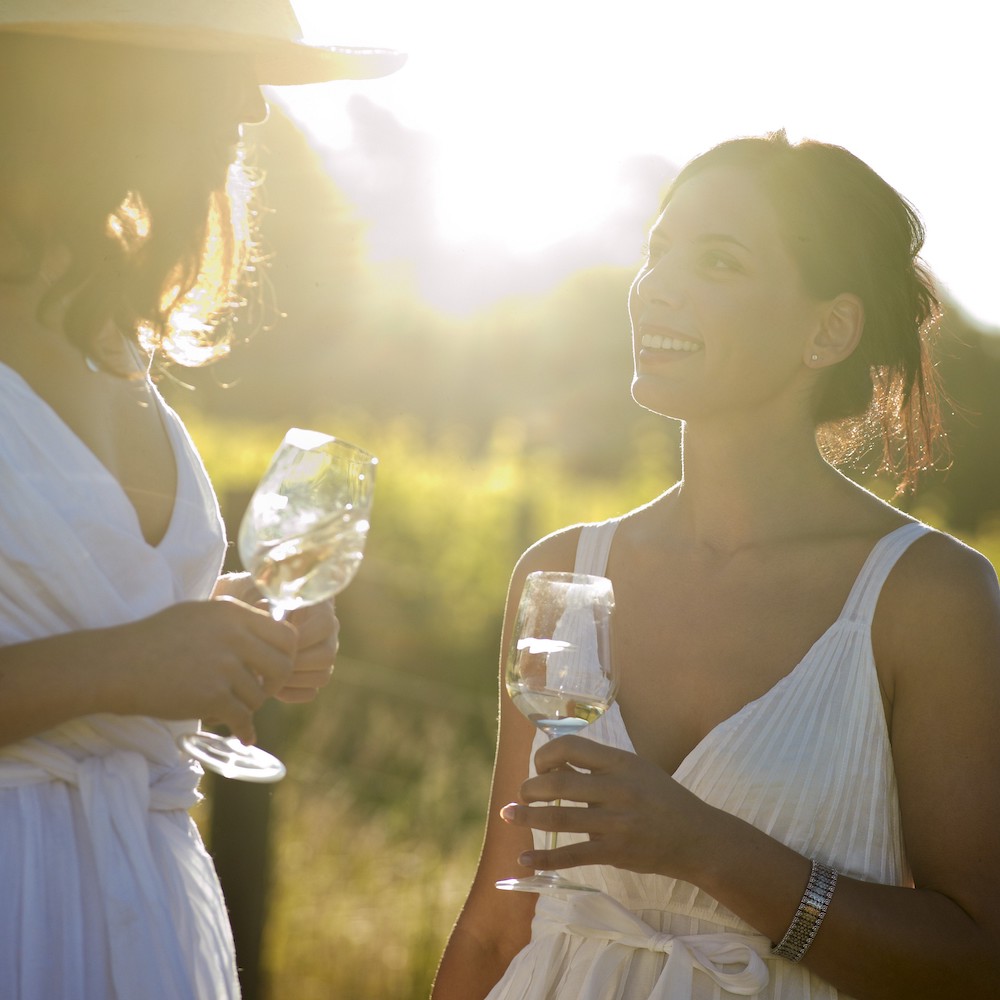 Couple enjoying a glass of wine. Hunter Valley wine tour hunter valley day trip from sydney