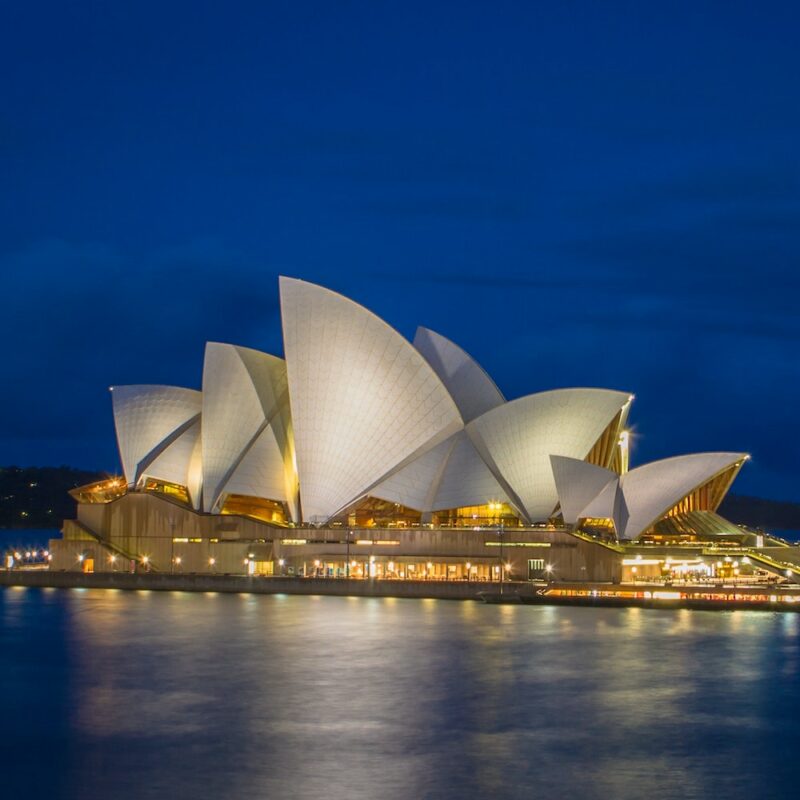 View of the Sydney Opera House from the Cahill Walkway after sunset.