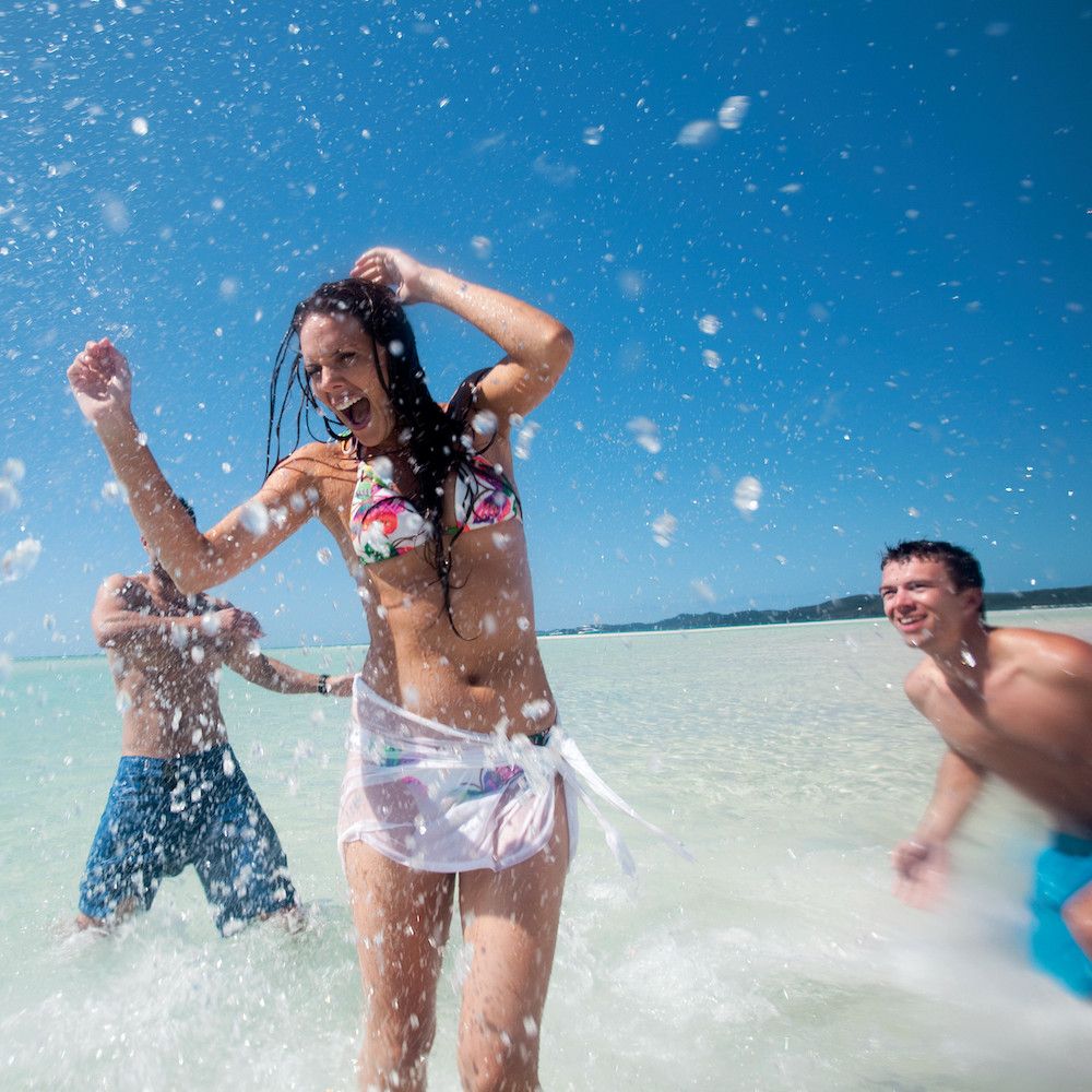 Whitehaven Beach fun in the water, on our Whitsunday Island boat tour. East Coast australia Tour