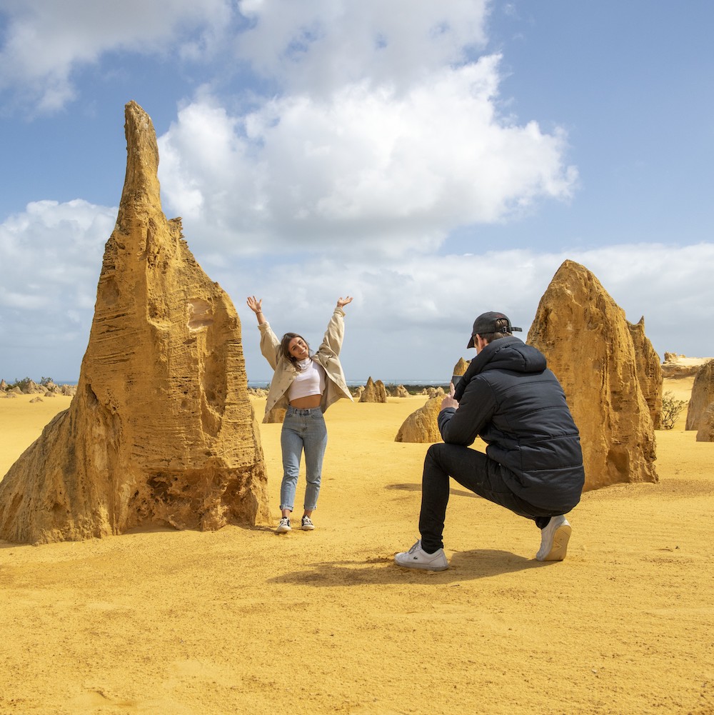 Couple taking a picture at the Pinnacles on our Pinnacles Tours