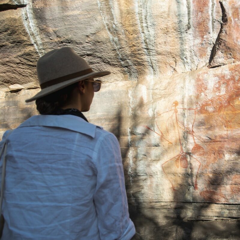 Lady looking at the UBIRR SUNSET on our kakadu national park 3 day tours. Perfect kakadu tours for seniors