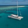 Real Aussie Adventures, Small Group Adventure Tours Australia. Mackay Sailaway VII boat View of the boat and Great Barrier Reef on our Port Douglas tours.