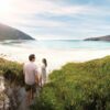 Real Aussie Adventures, Small Group Adventure Tours Australia. Walking on the beach Wineglass Bay, Freycinet on our Wineglass Bay tour in Tasmania. tours from hobart to wineglass bay