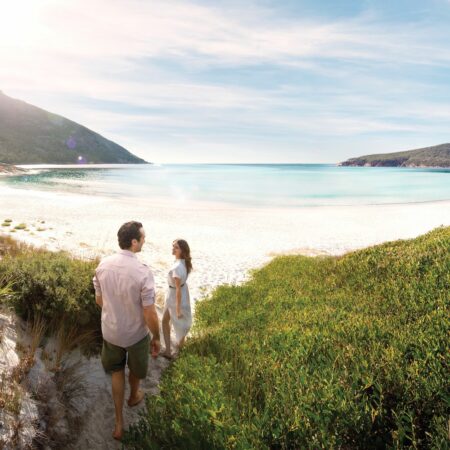 Real Aussie Adventures, Small Group Adventure Tours Australia. Walking on the beach Wineglass Bay, Freycinet on our Wineglass Bay tour in Tasmania. tours from hobart to wineglass bay