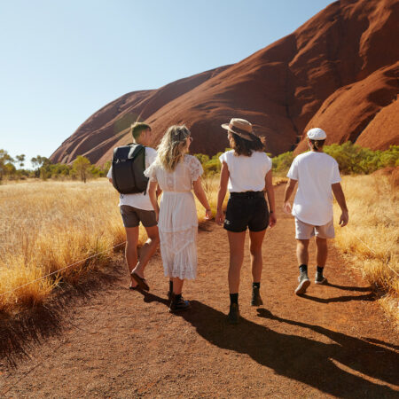 Real Aussie Adventures, Small Group Adventure Tours Australia. Group of Friends at Uluru Red Centre tours, Australia.