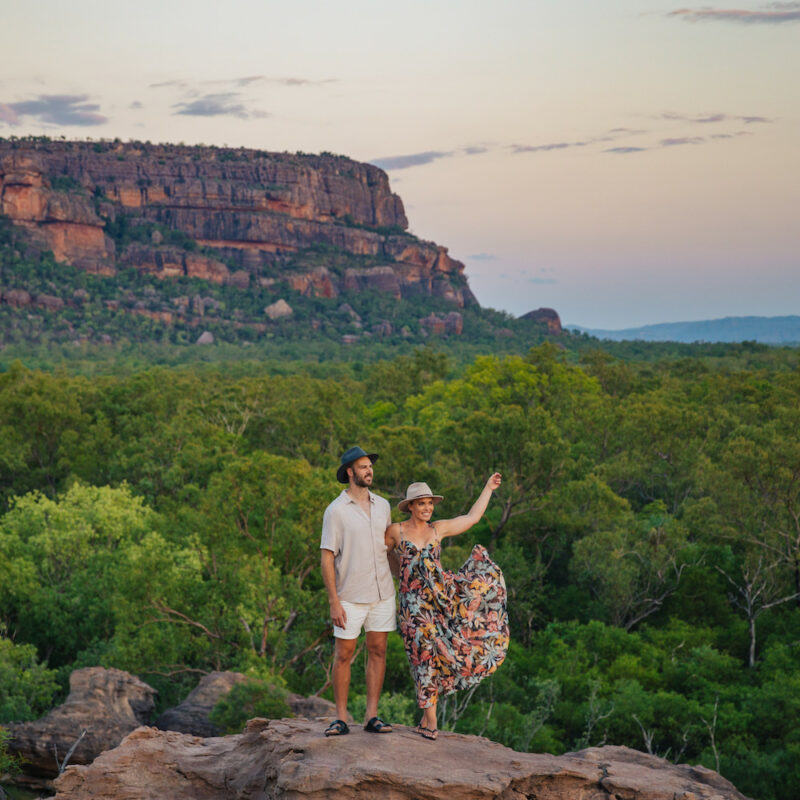 Real Aussie Adventures, Small Group Adventure Tours Australia. Couple at Nawurlandja lookout on our 4 day Kakadu National Park Tour from Darwin kakadu katherine and litchfield adventure