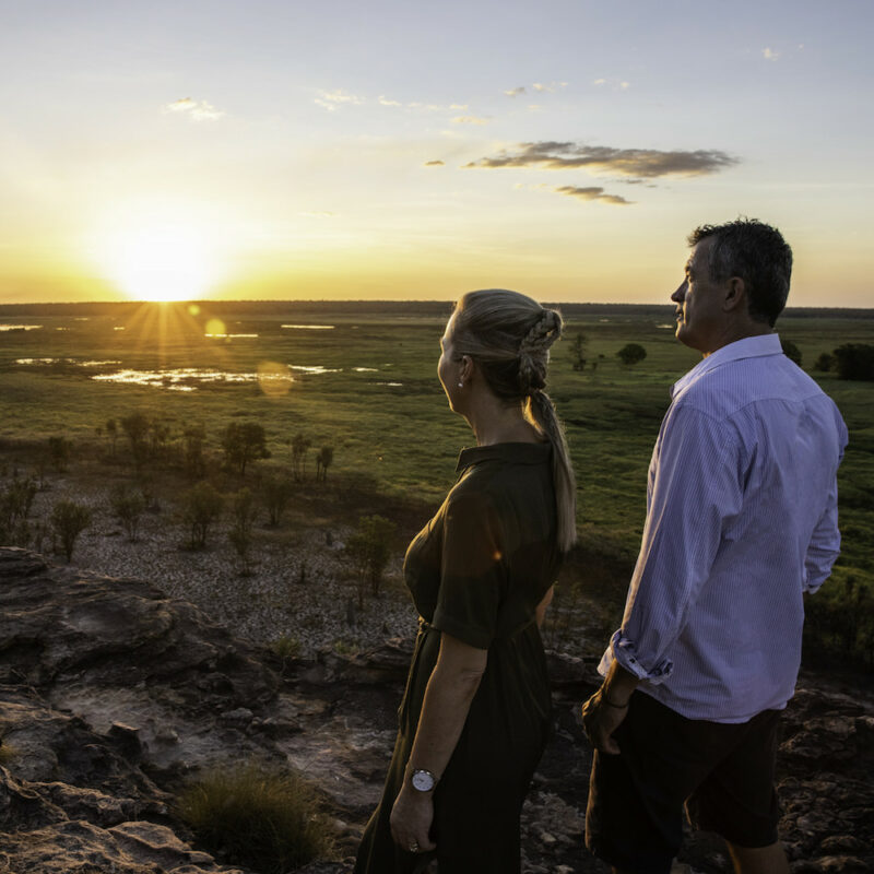 Real Aussie Adventures, Small Group Adventure Tours Australia. Couple at the Nadab Lookout at Ubirr on our 4 day Kakadu National Park Tour from Darwin