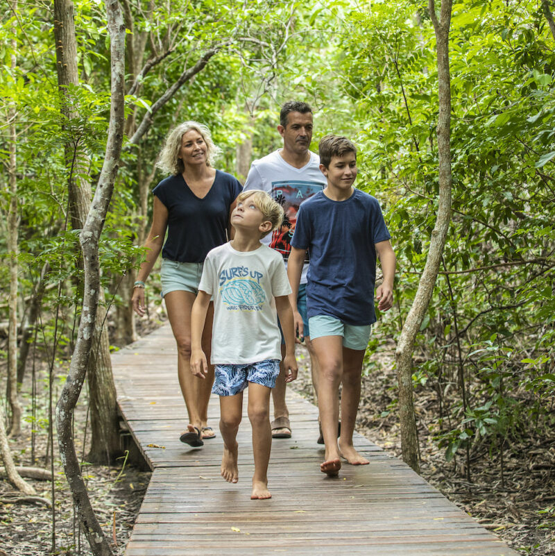 Real Aussie Adventures, Small Group Adventure Tours Australia. Family walking along track to lookout on Whitsunday Island