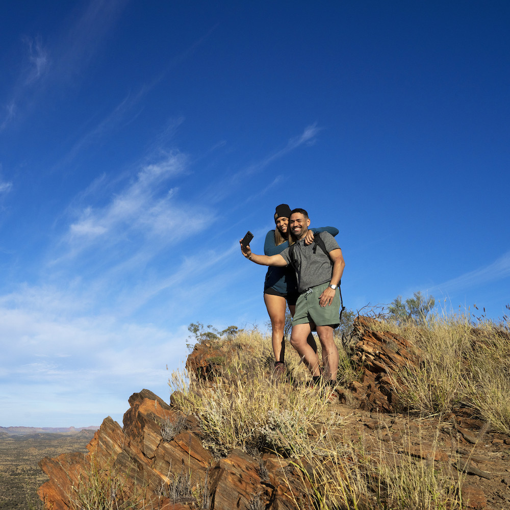 People hiking along the Larapinta Trail at Euro Ridge